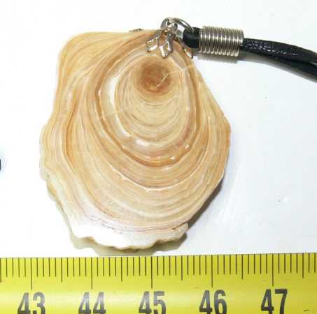 Polished calcite pendant on both sides from Hungary